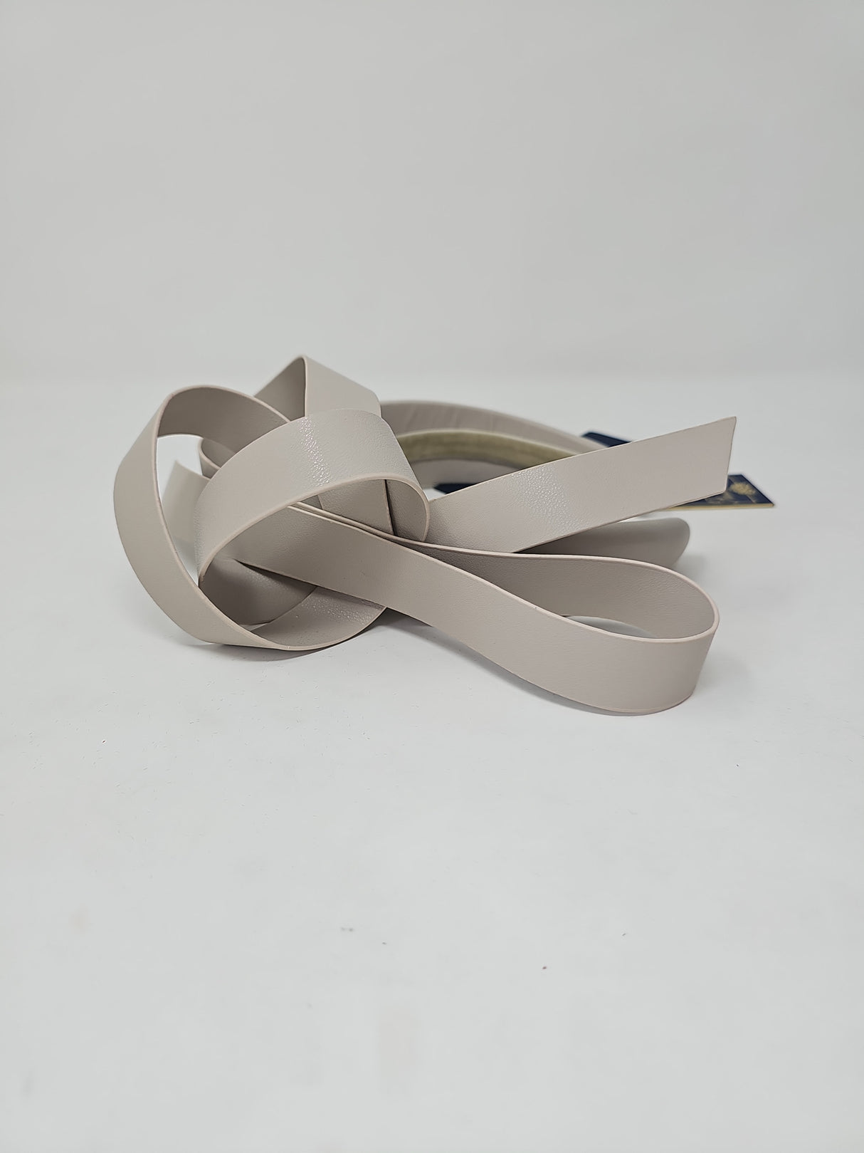 Praline Leatherette Bow Hairband Fascinator