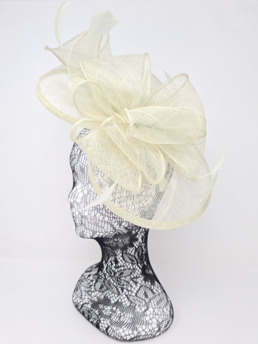 Pale green Sinamay disc Fascinator - Franklins