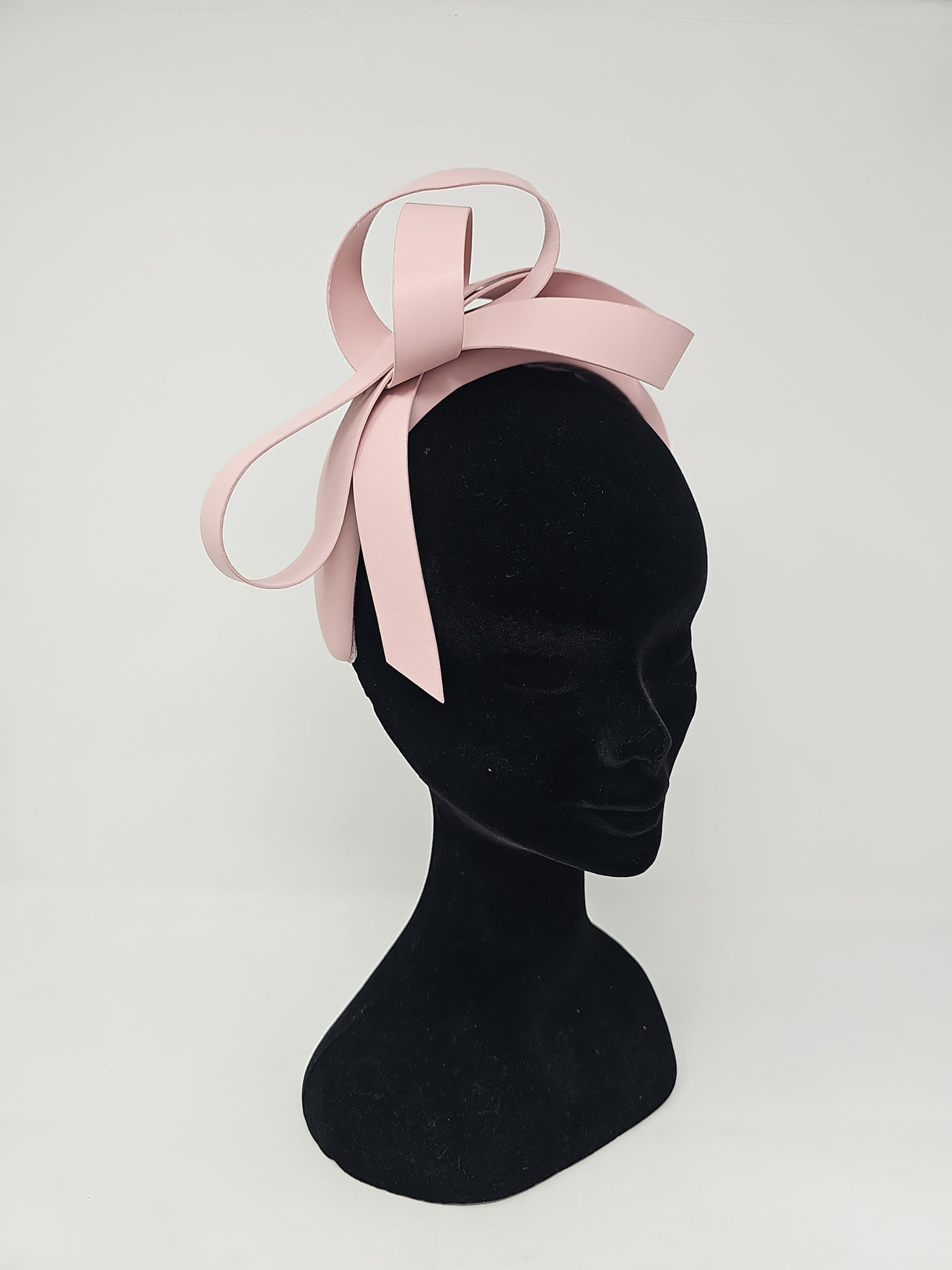 Quartz Pink Leatherette Bow Hairband Fascinator