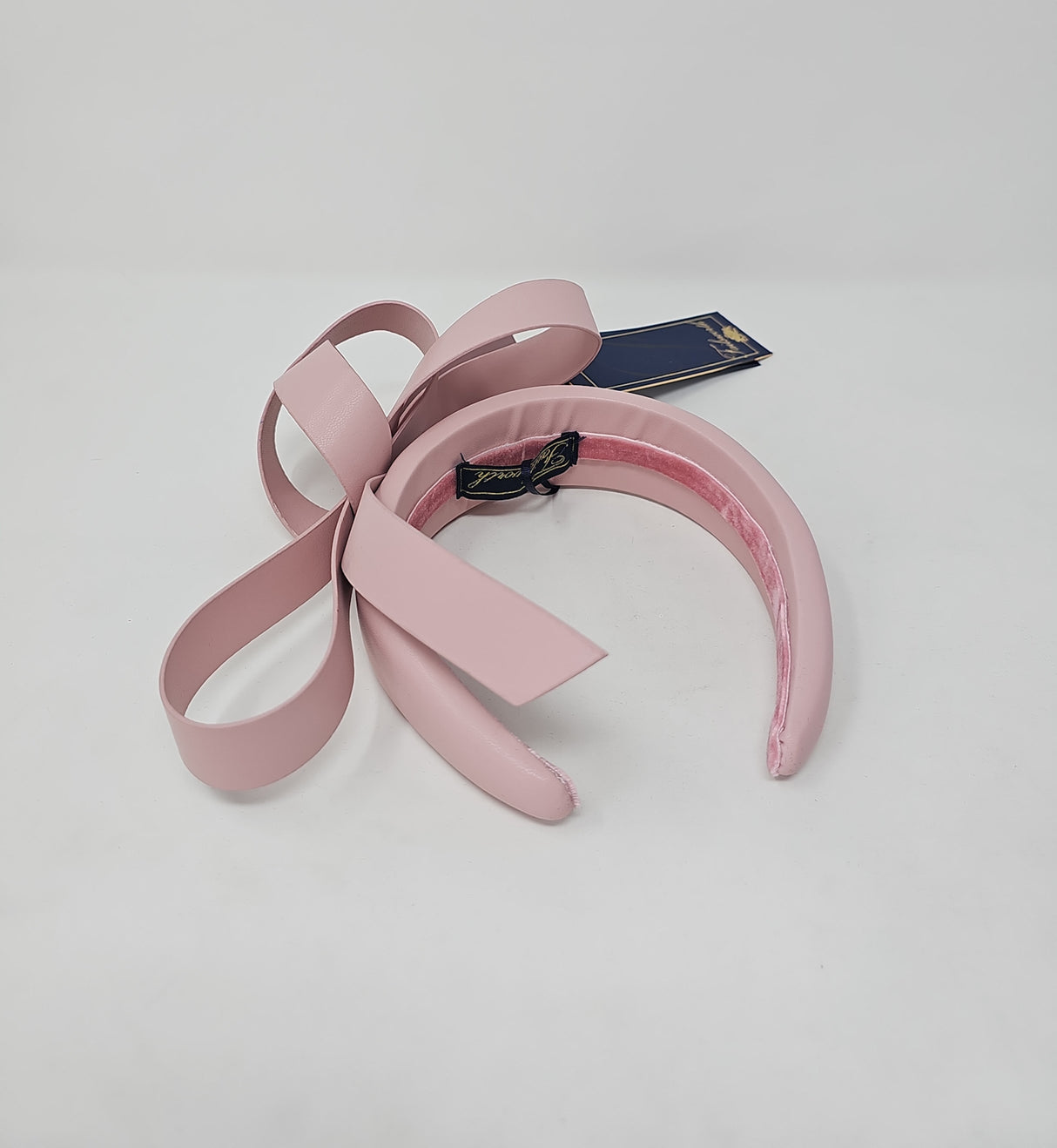 Quartz Pink Leatherette Bow Hairband Fascinator