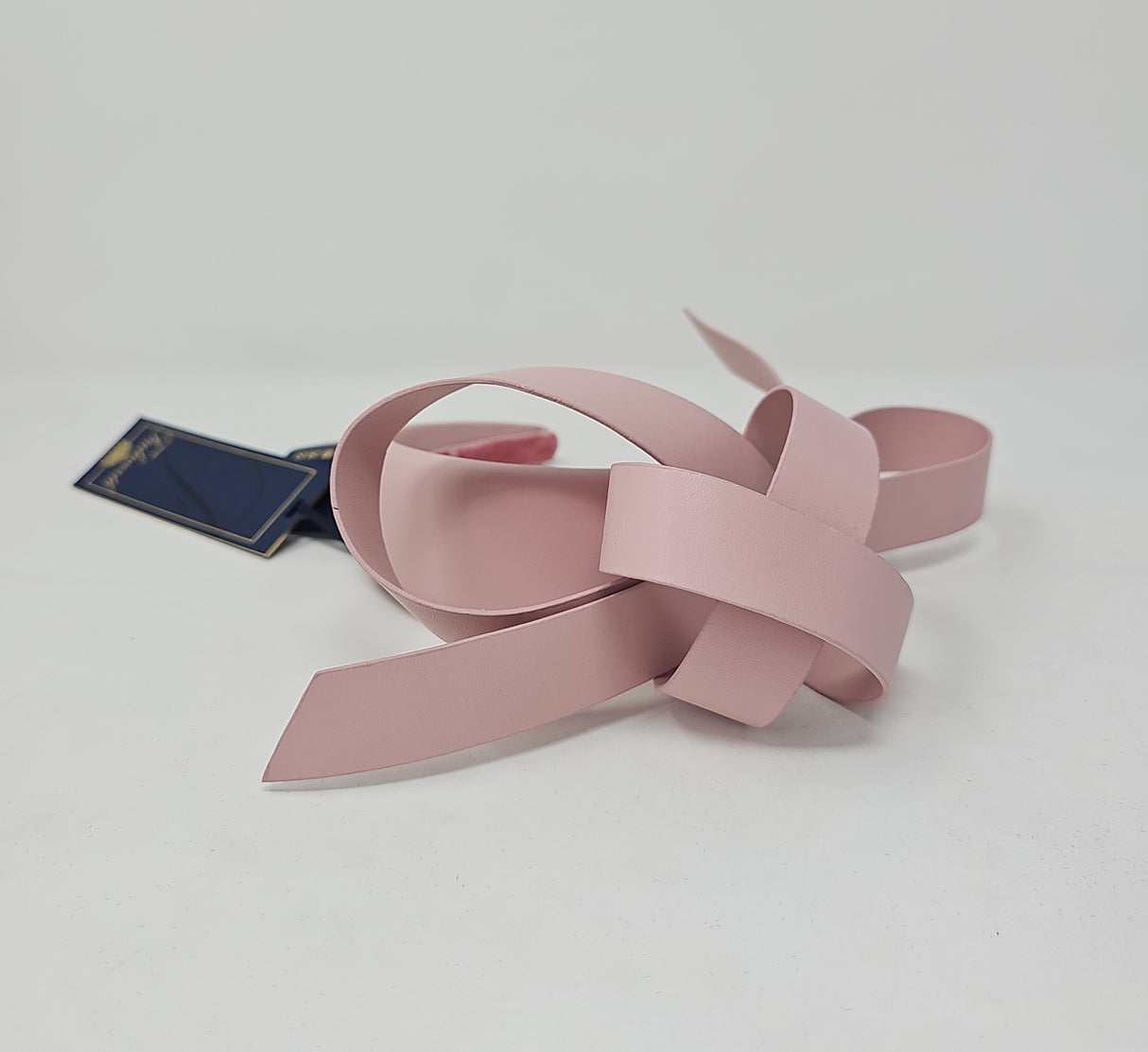 Quartz Pink Leatherette Bow Hairband Fascinator